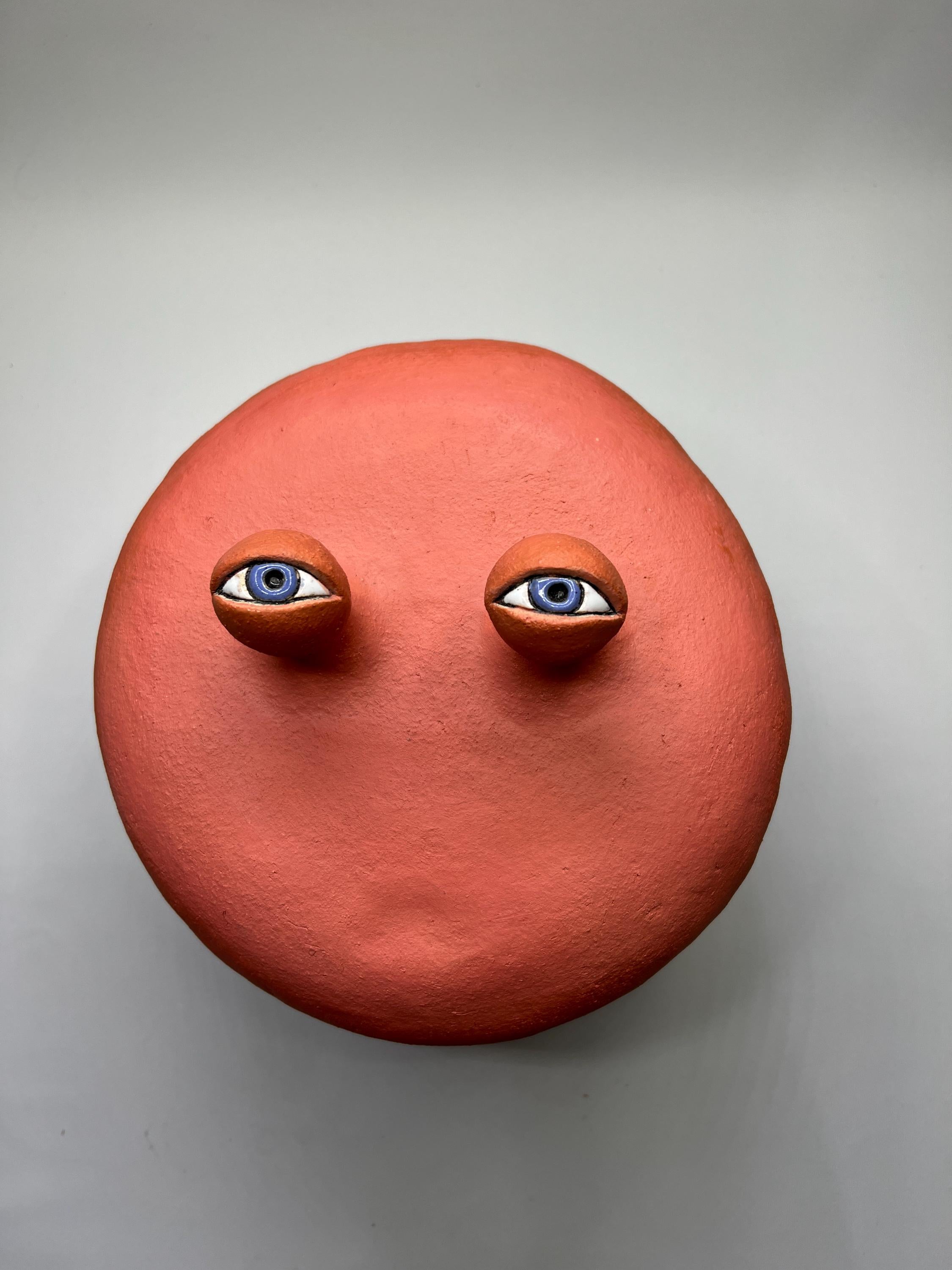 Теракотова керамічна маска з очима